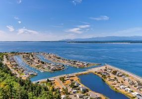 Lagoon Point. Canal, boats, neighborhood, community, Whidbey Island, Windermere real estate south Whidbey, Greenbank